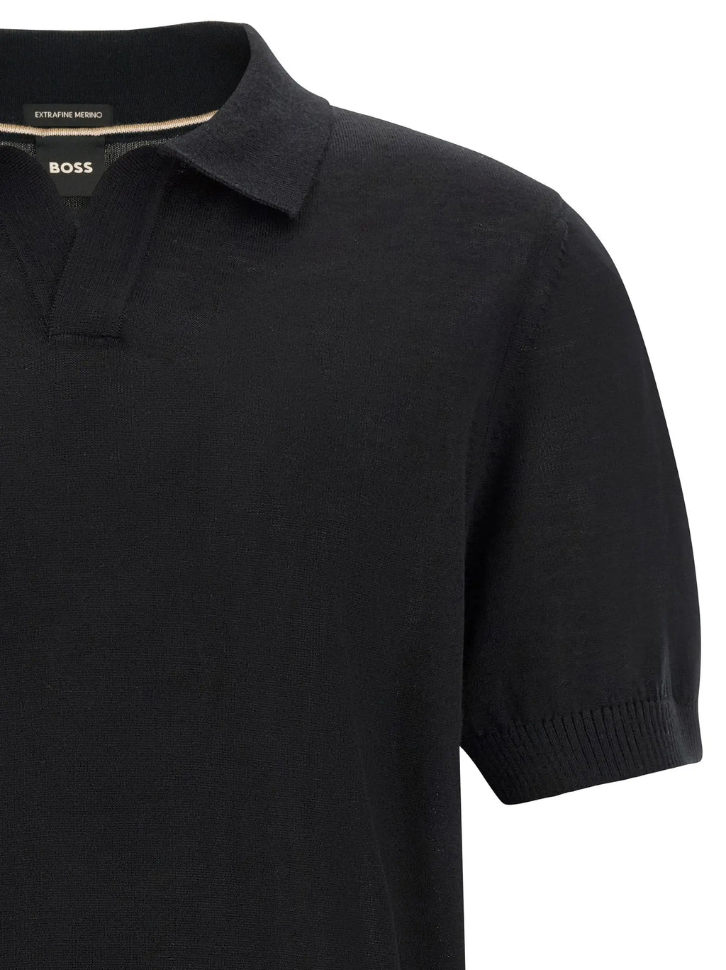 Polo hugo boss noir en laine vierge avec texture fine en maille et poignets côtelés