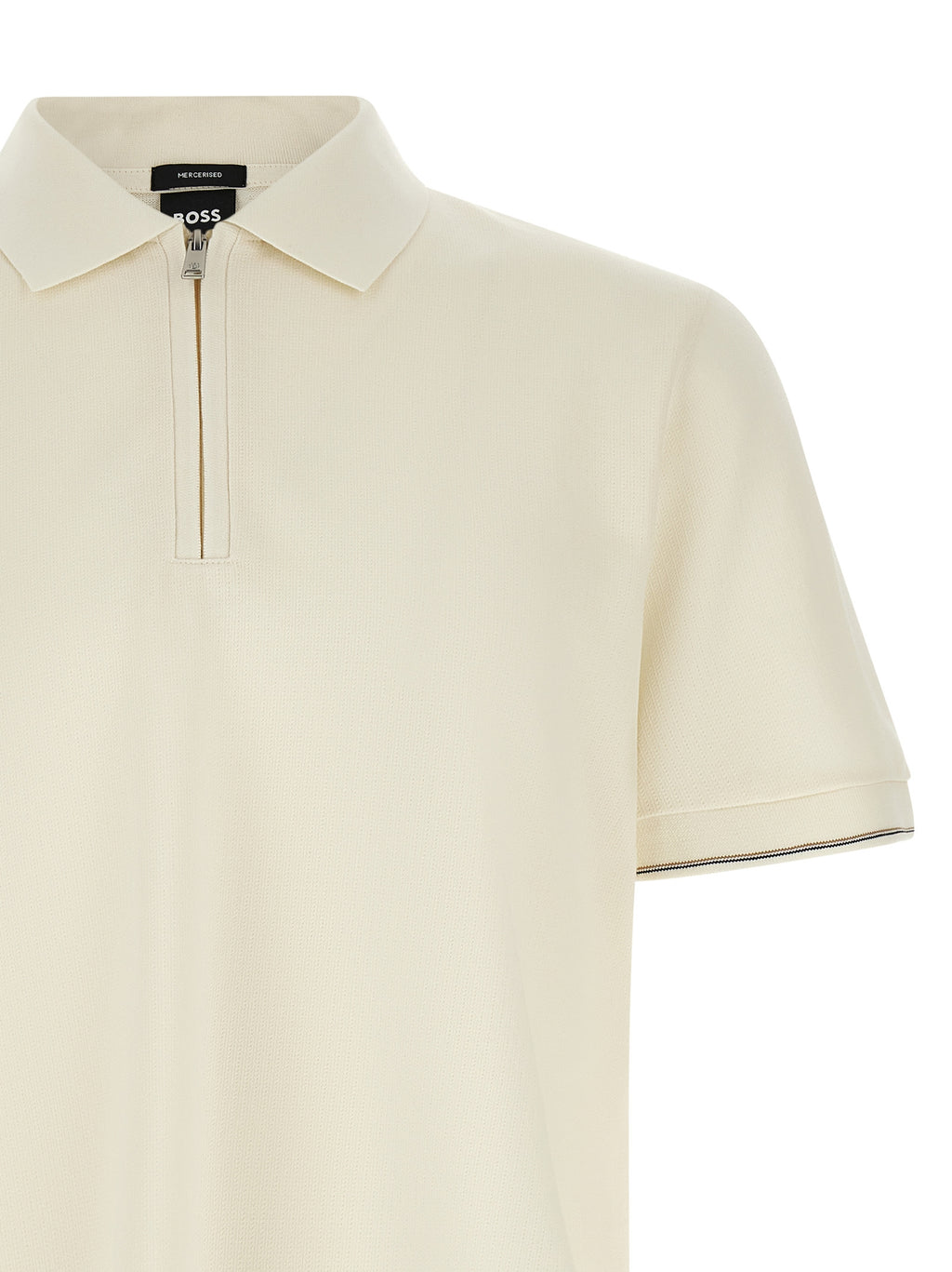 Chemise polo beige en coton de la marque Hugo Boss, vue de face, avec col et boutons visibles.