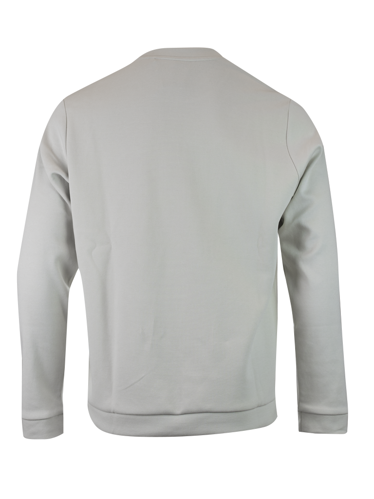 Sweatshirt beige en coton à col rond de la marque Hugo Boss, vue de face, avec logo discret sur la poitrine.