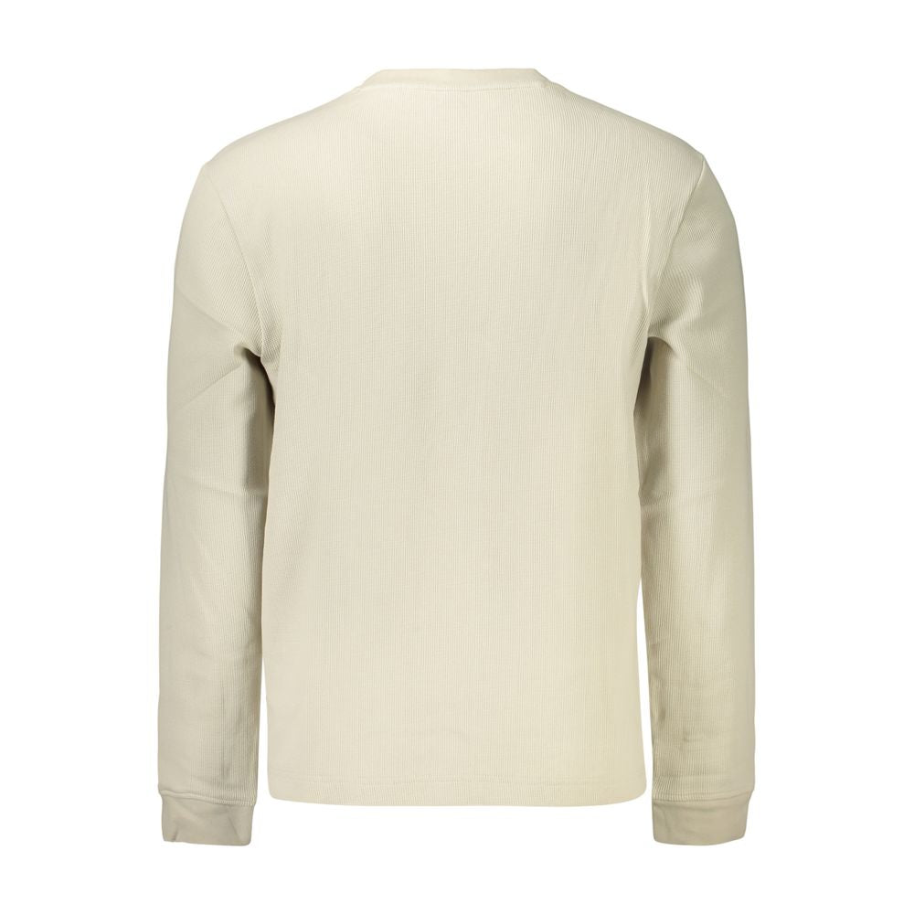Chemise homme beige en coton de marque Hugo Boss, coupe classique avec col et boutons visibles.