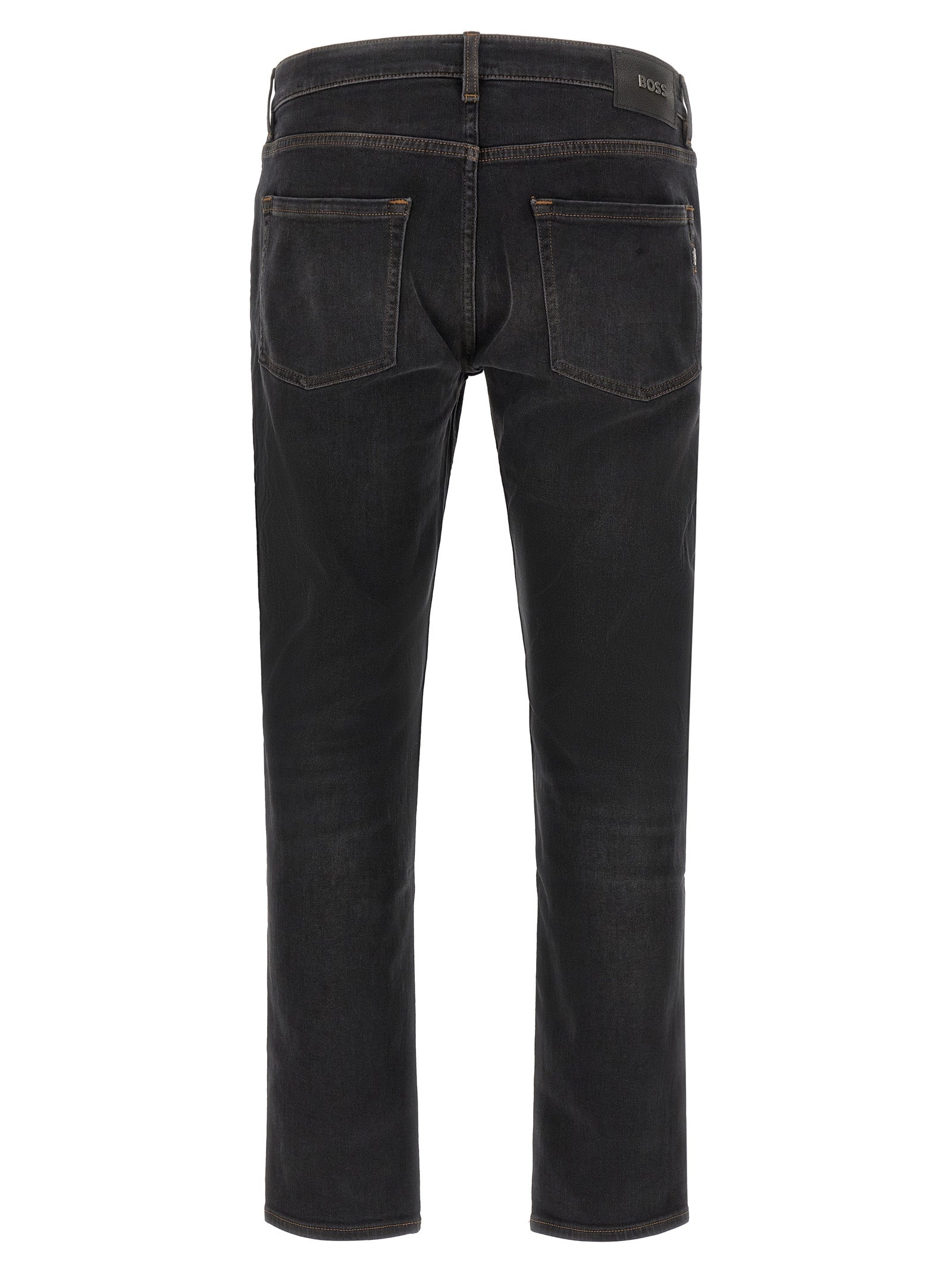 Jeans droits en coton noir de Hugo Boss, style classique et ajusté, visibles avec détails de couture et fermeture éclair.