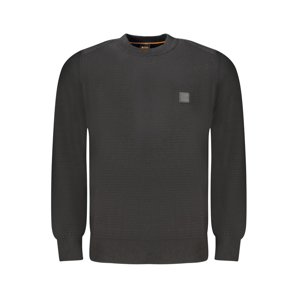 Pull homme Hugo Boss en coton noir, style classique, avec col rond et manches longues, parfait pour un look élégant.