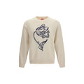 Pull en coton beige kenzo avec un motif tulipe bleu marine brodé sur le devant en tricot crème