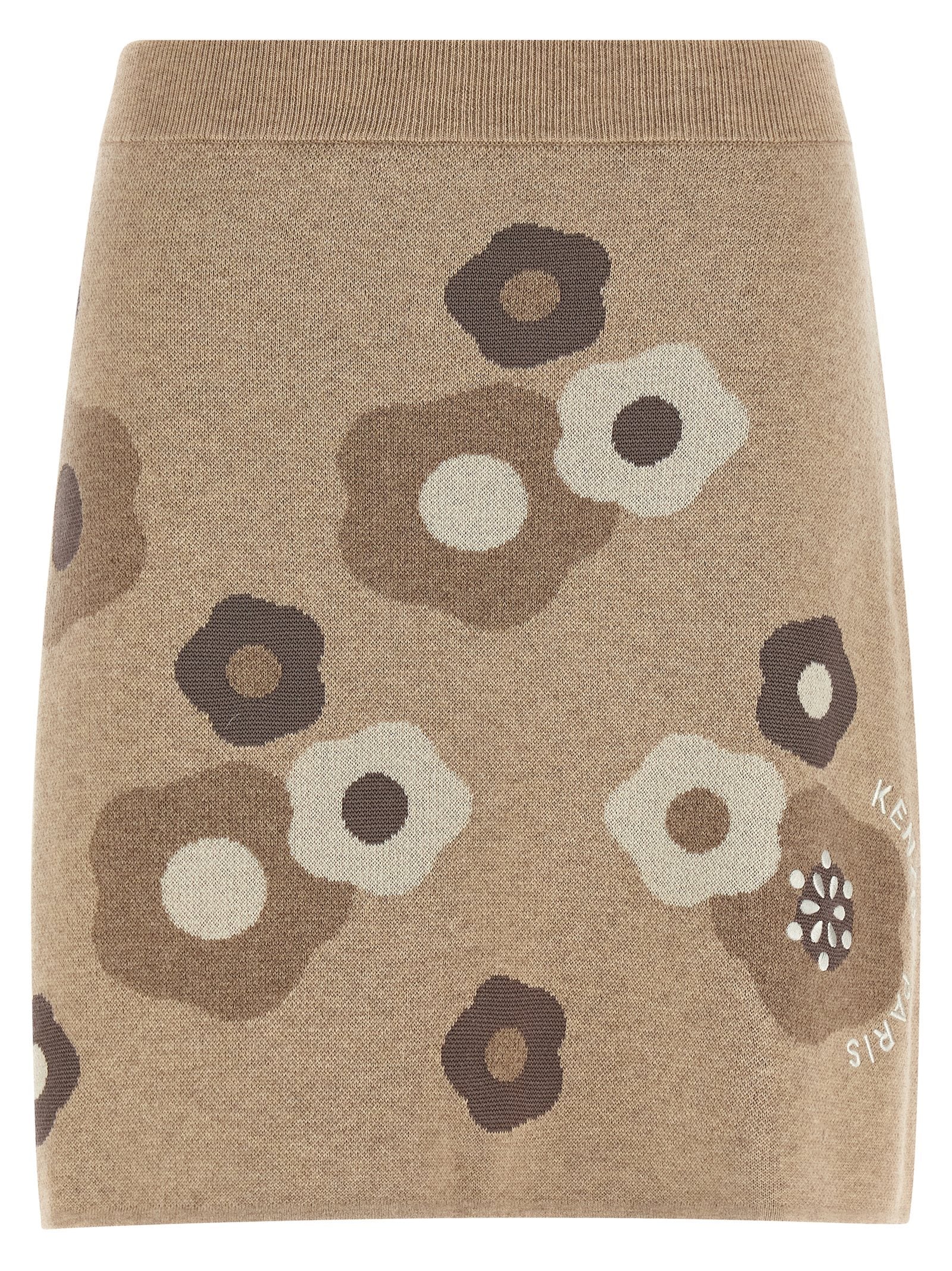 Jupe longue beige en laine de la marque Kenzo, coupe élégante et confortable, portée avec un haut tendance.