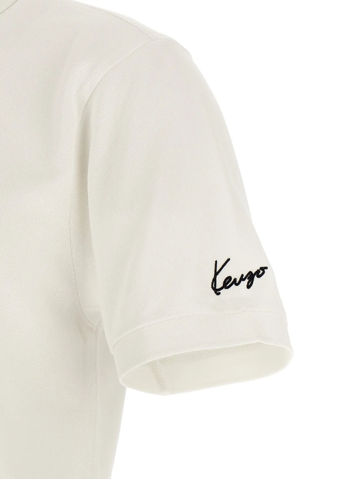 Polo kenzo blanc en coton avec logo noir brodé sur la manche en crème
