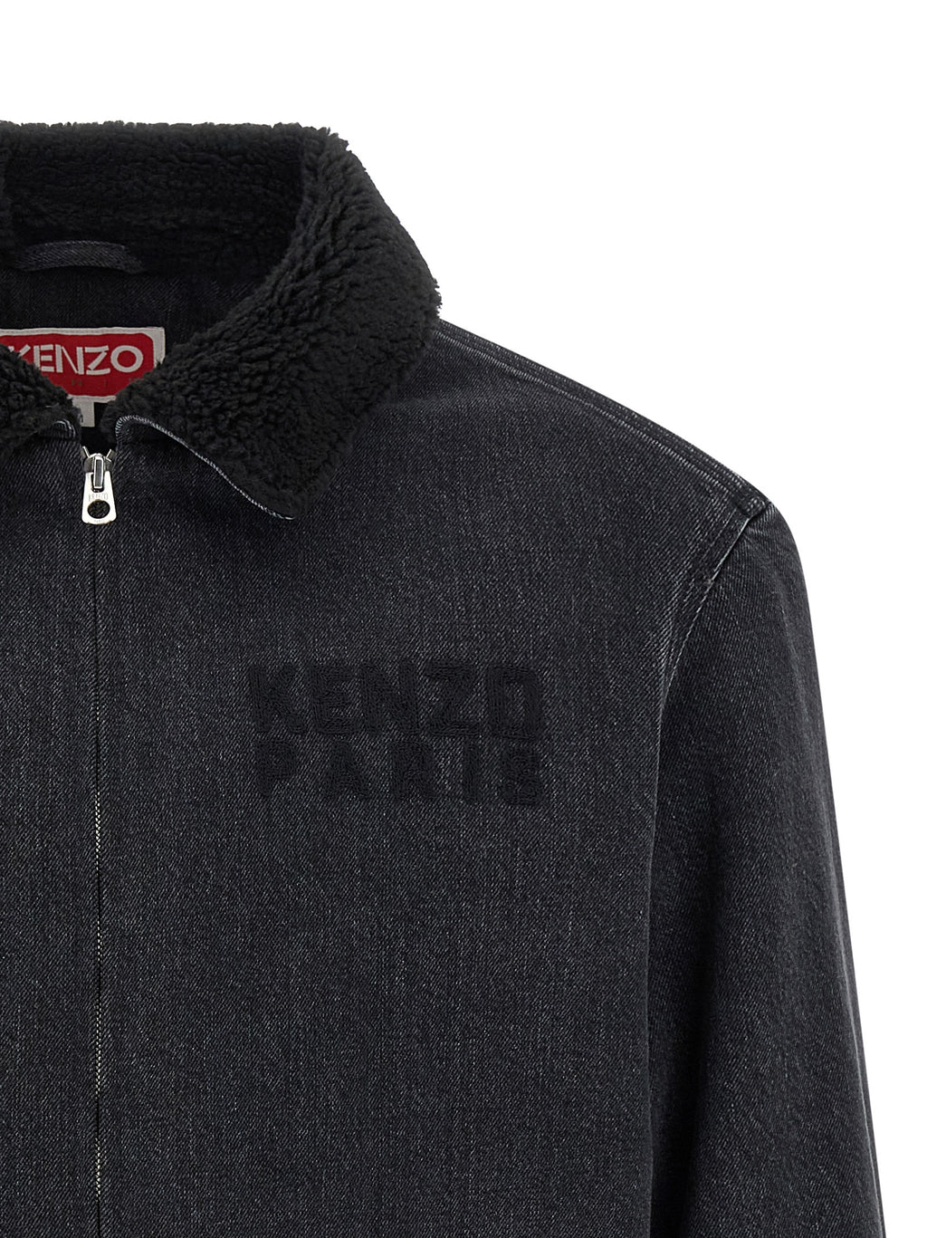 Veste en jean noire en coton de la marque Kenzo, coupe classique avec détails de couture visibles.
