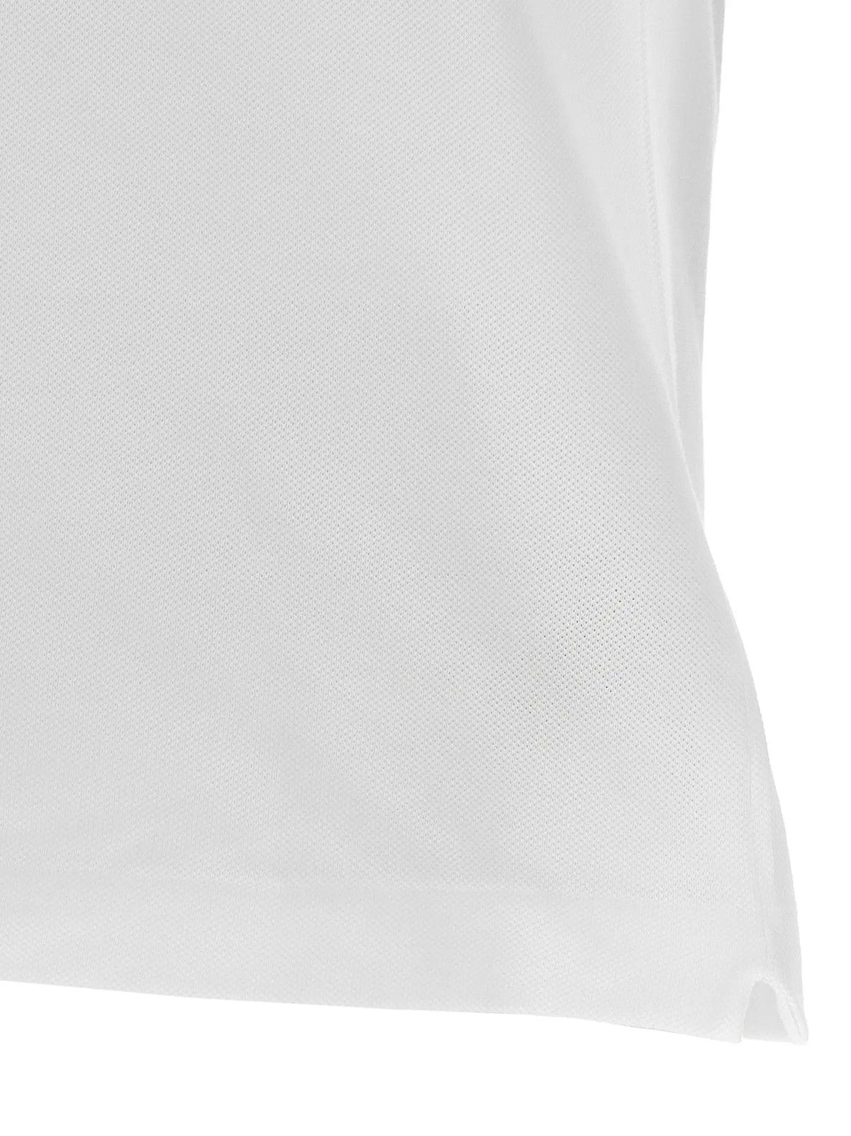 Tissu en maille blanche avec motif texturé subtil pour polo lacoste en coton blanc