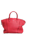 Sac bandoulière Louis Vuitton Griotte en cuir Taurillon, Lockit MM souple, design élégant et luxueux, visible en détail dans l'image.