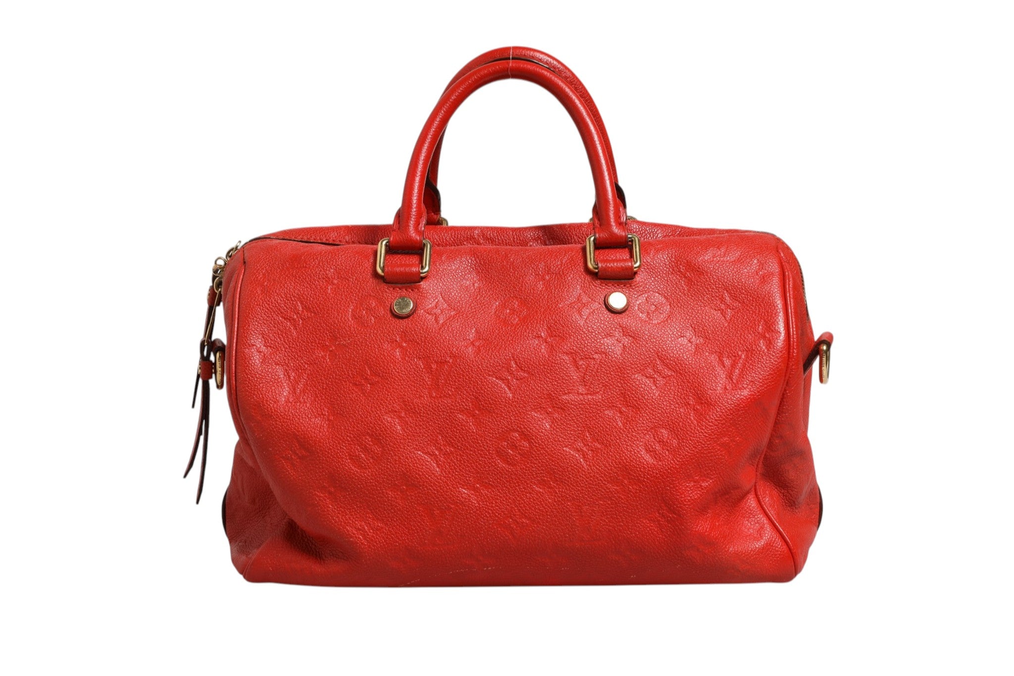 Sac Louis Vuitton Speedy Bandoulière 30 en monogramme rouge Empreinte, avec poignées en cuir et bandoulière ajustable.