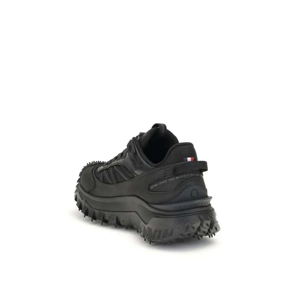 Basket de sport moncler en cuir de veau noir avec semelle texturée robuste et design superposé upper