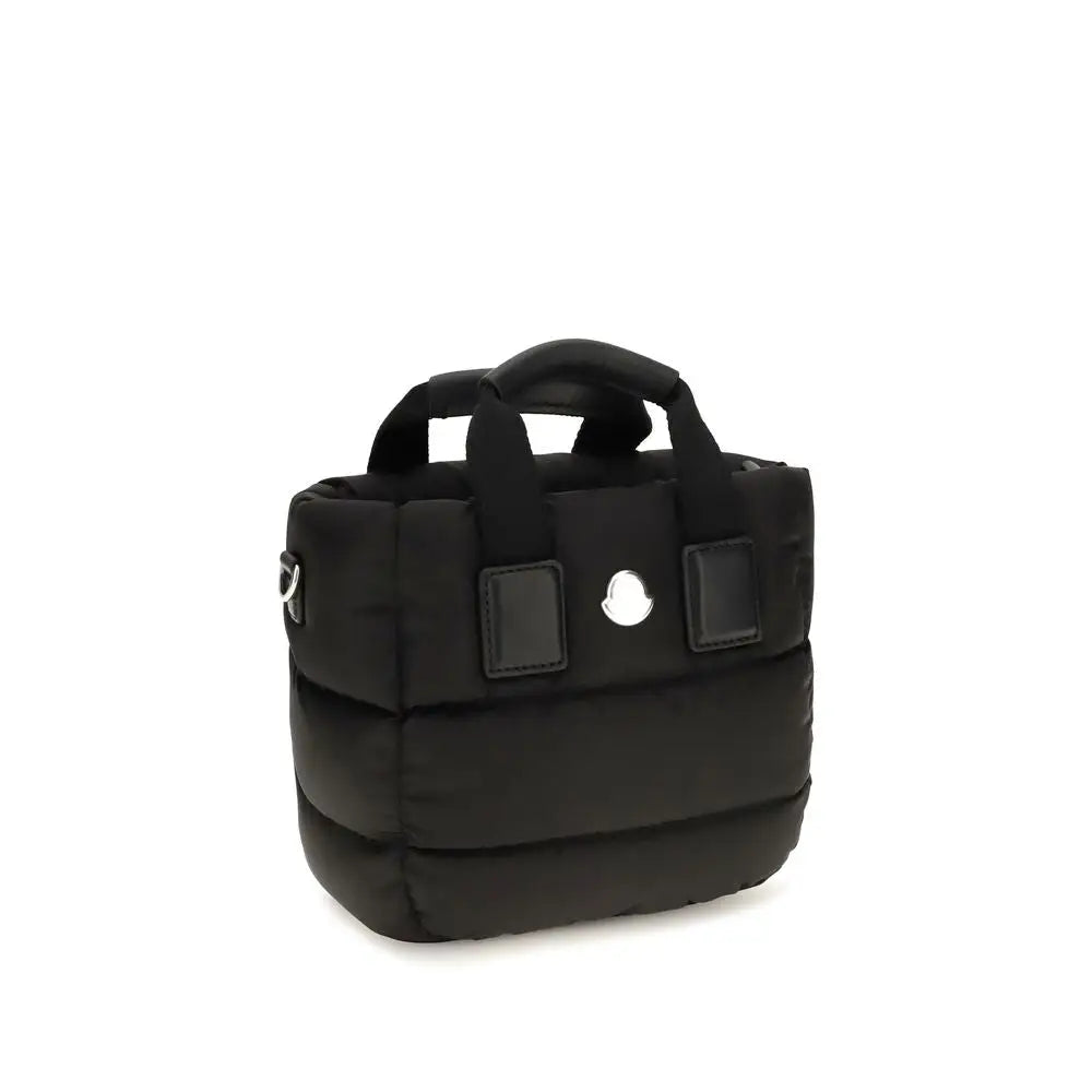 Moncler sac à main noir en nylon avec design matelassé, poignées en tissu noir et plaque logo argentée