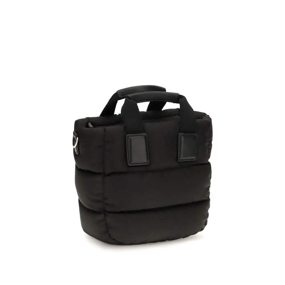 Black nylon moncler handbag tote with puffer style padded handles and rectangular leather-like patches on front