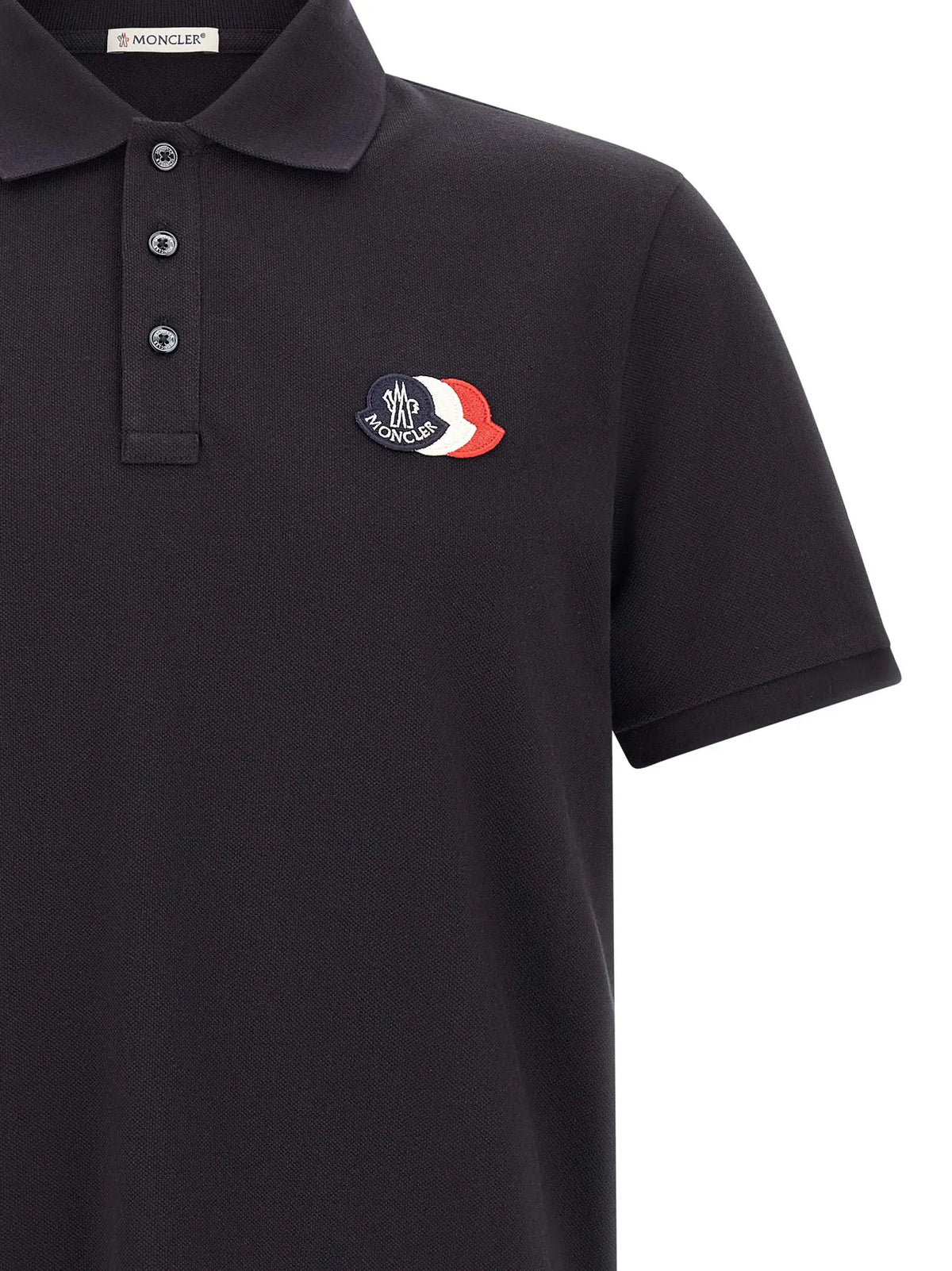 Polo shirt moncler bleu en coton avec tissu texturé et logo brodé rouge blanc bleu sur la poitrine gauche