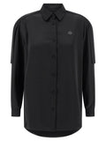 Blouse en polyester noire de la marque MONCLER GENIUS, style élégant et moderne, vue de face avec détails de tissu.
