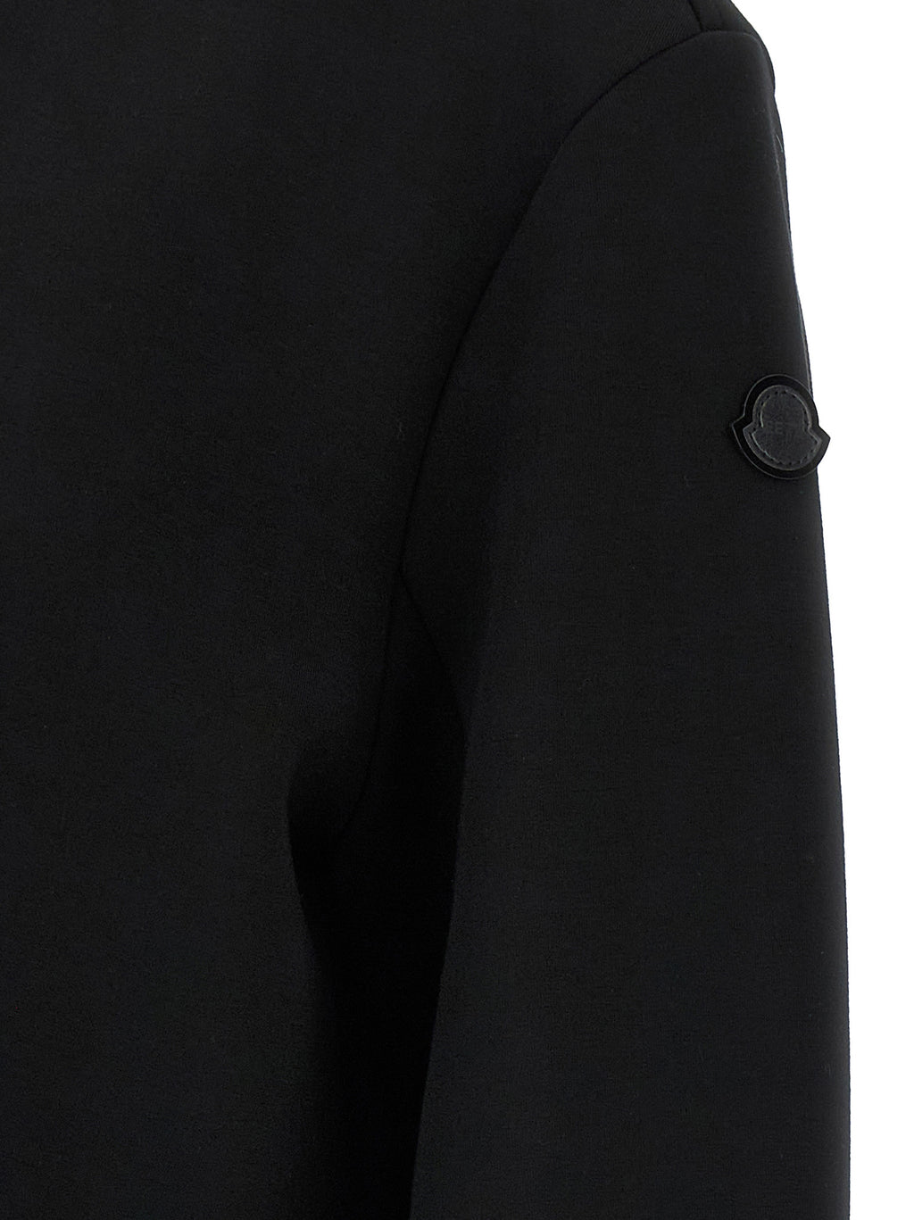 Sweat-shirt en viscose noir de MONCLER GENIUS avec logo brodé, porté de face, mode décontractée et élégante.