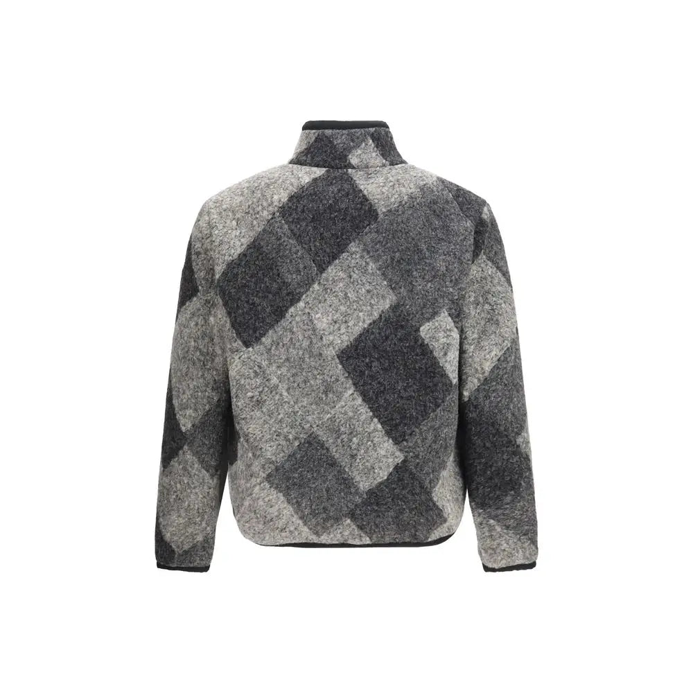 Veste moncler grise en laine avec motif argyle noir et gris en polaire col montant