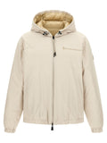 Veste en polyamide beige Moncler Grenoble, coupe-vent et imperméable, avec capuche et détails ajustables.