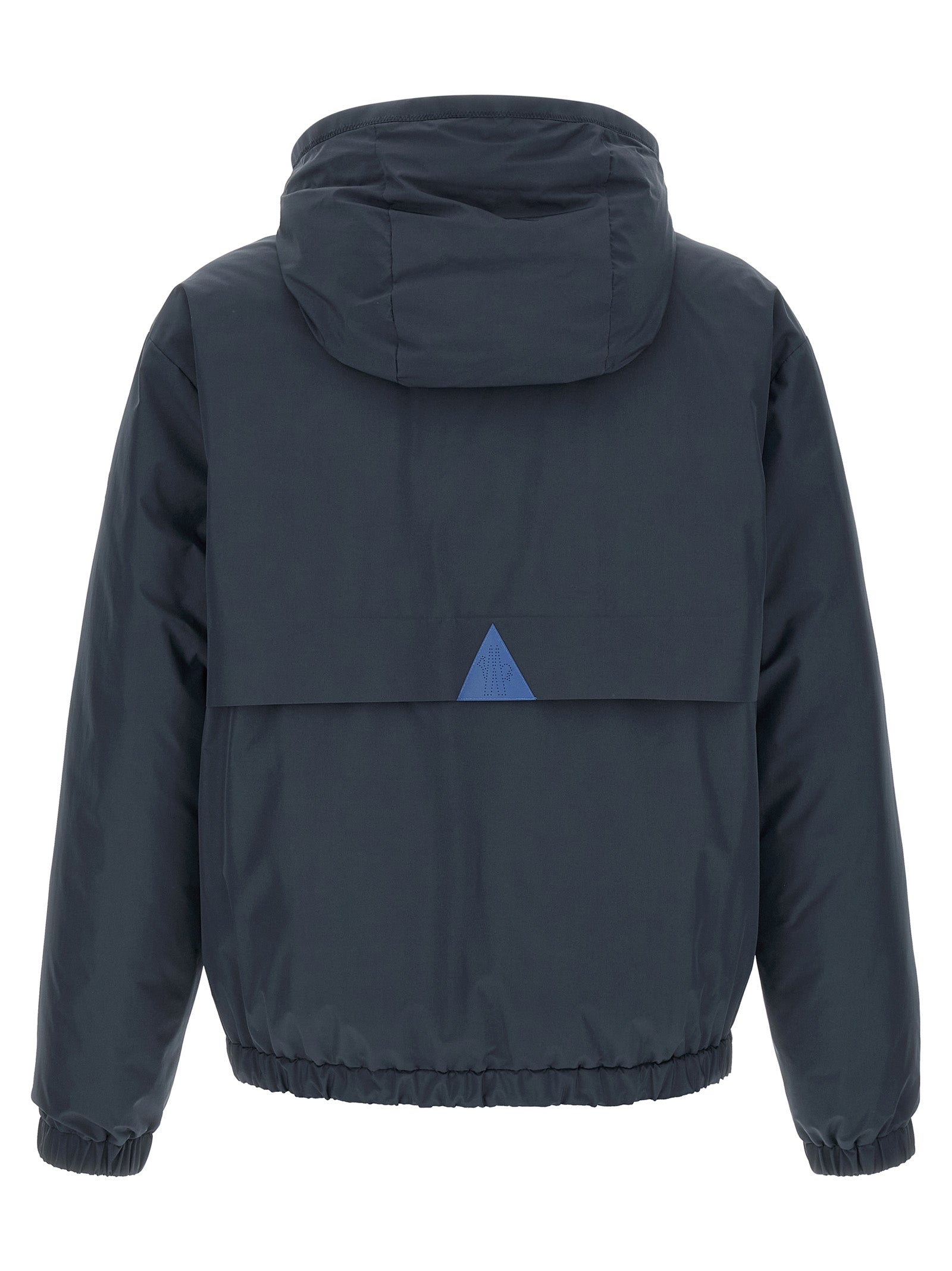 Veste en polyamide bleu Moncler Grenoble, coupe-vent et imperméable, visible en détail dans l'image.