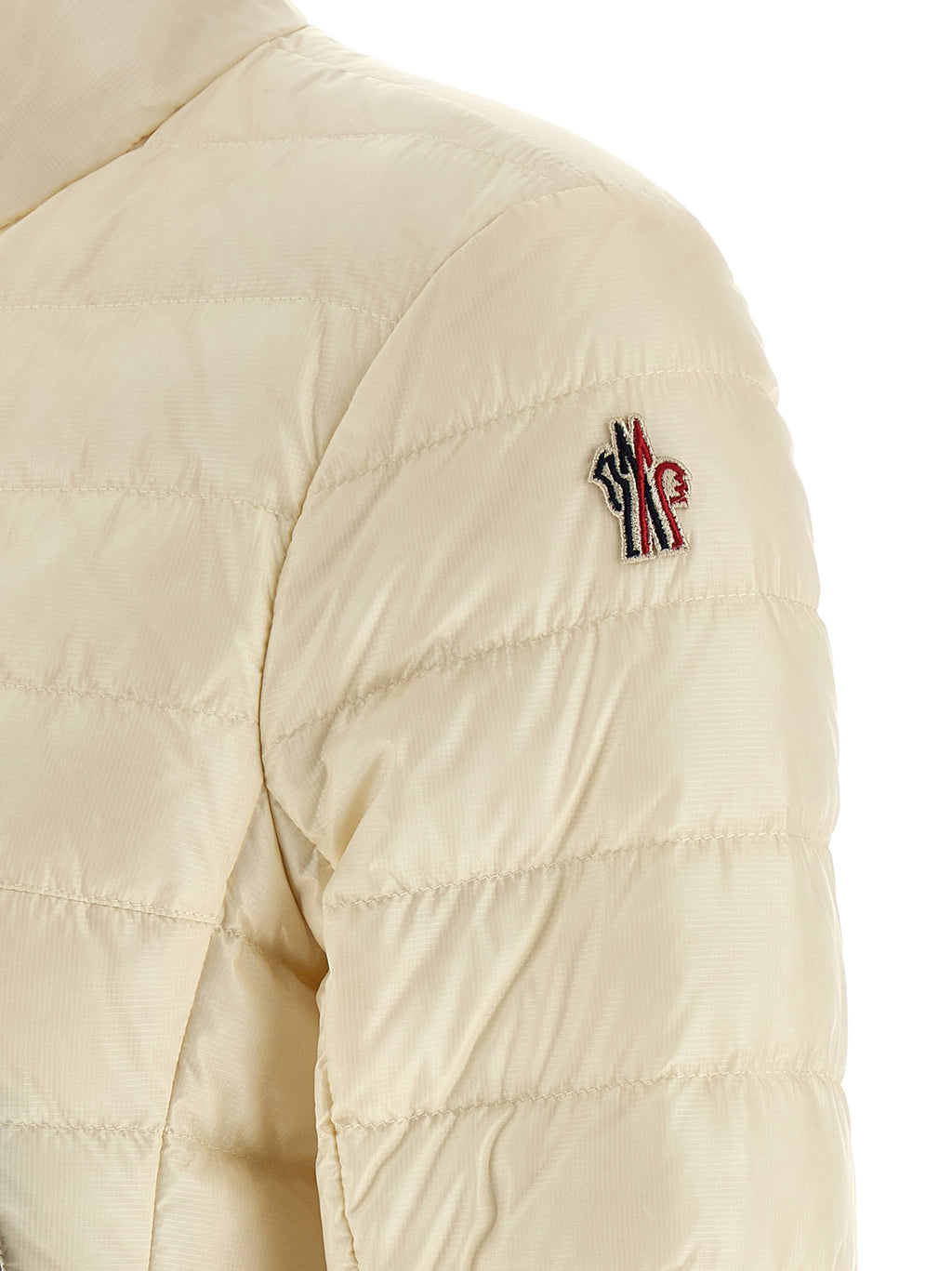 Veste longue en polyamide blanche Moncler Grenoble, style hivernal avec capuche et fermeture zippée.