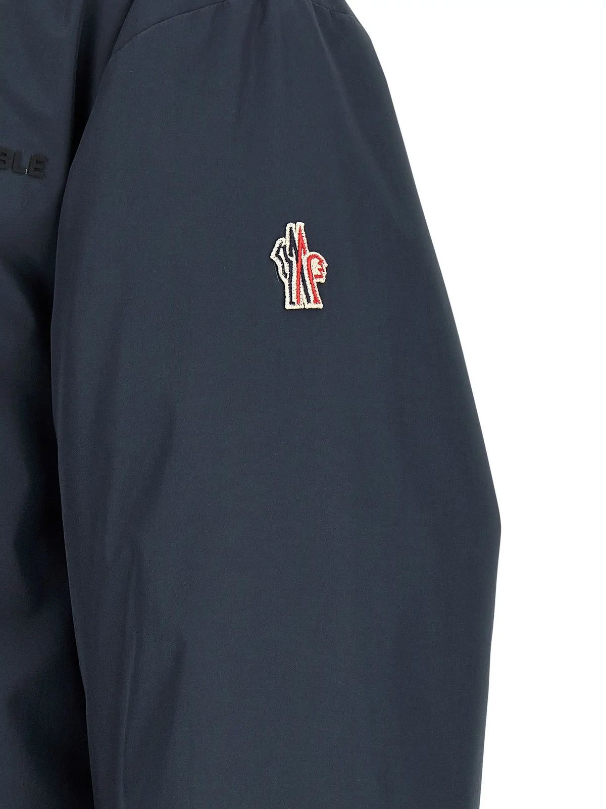 Manche de veste moncler grenoble bleu en polyamide avec logo brodé rouge blanc et noir