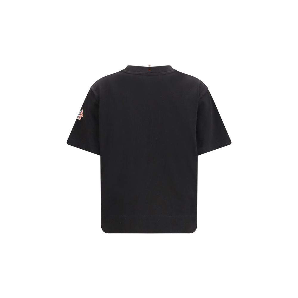 Vêtements de sport en coton noir Moncler Grenoble, style décontracté et élégant pour activités sportives ou casual.