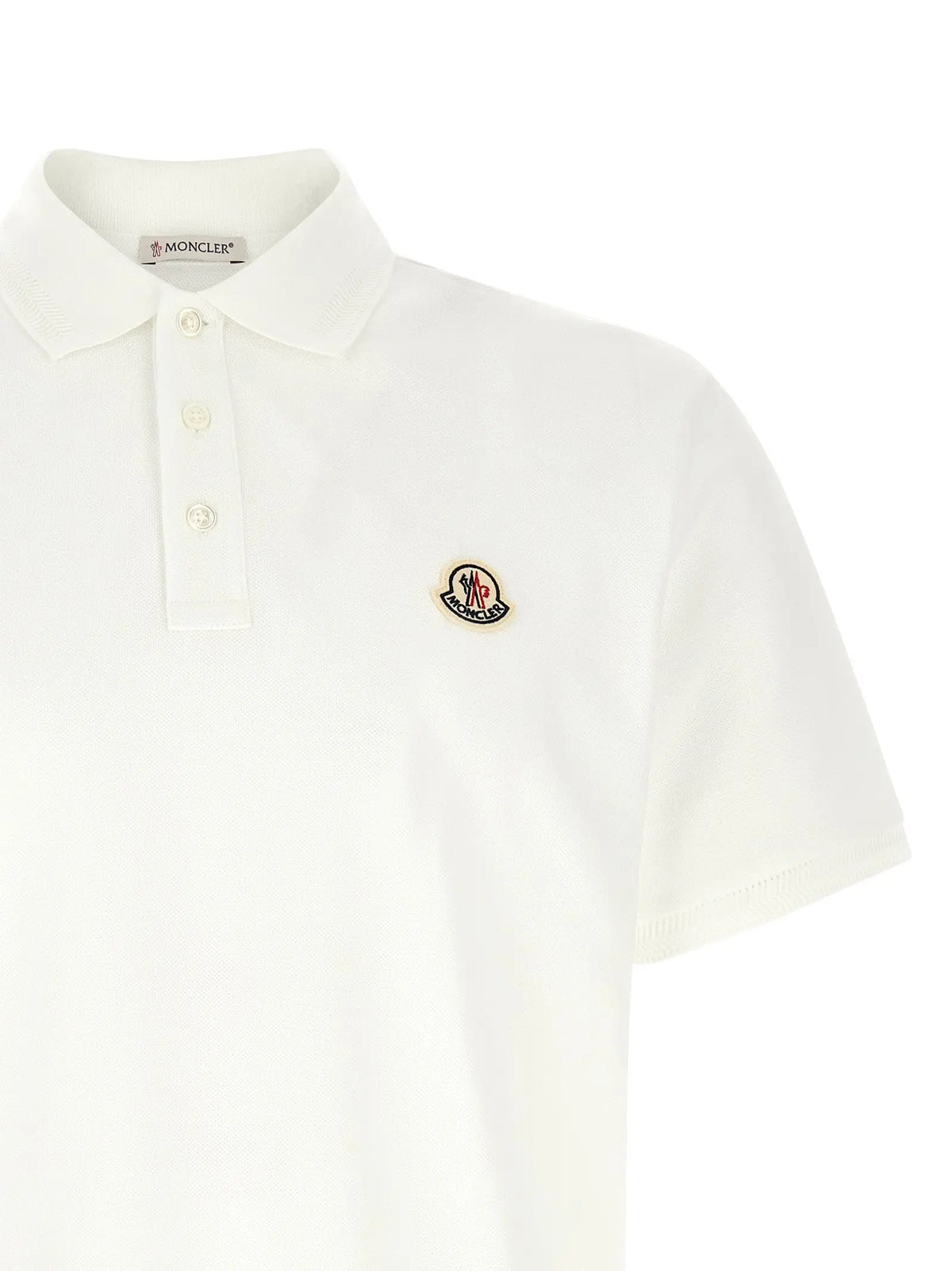 Polo blanc moncler en coton avec col classique manches courtes et logo brodé sur la poitrine gauche