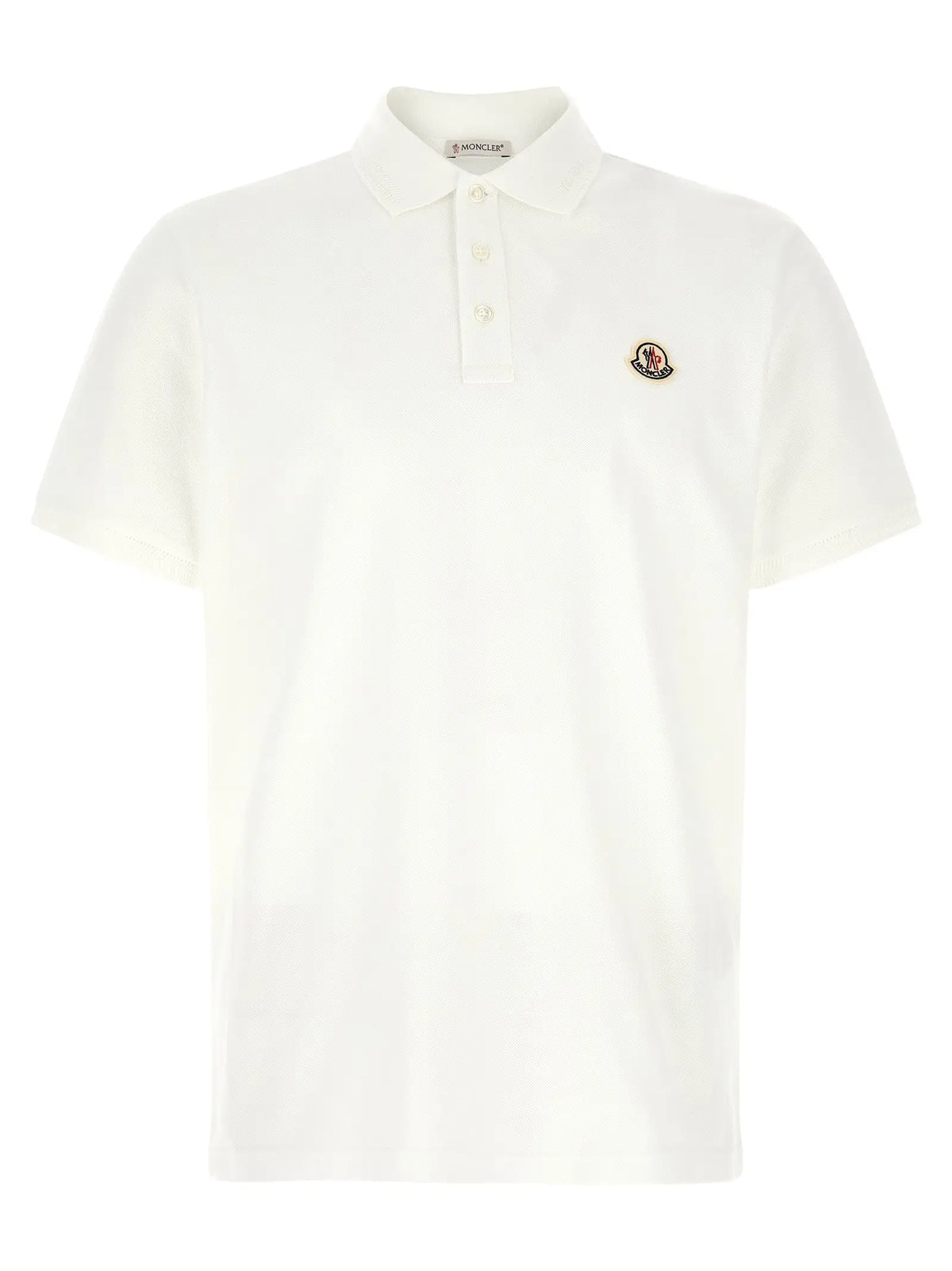 Polo blanc moncler en coton avec col classique manches courtes et logo brodé iconique sur la poitrine gauche