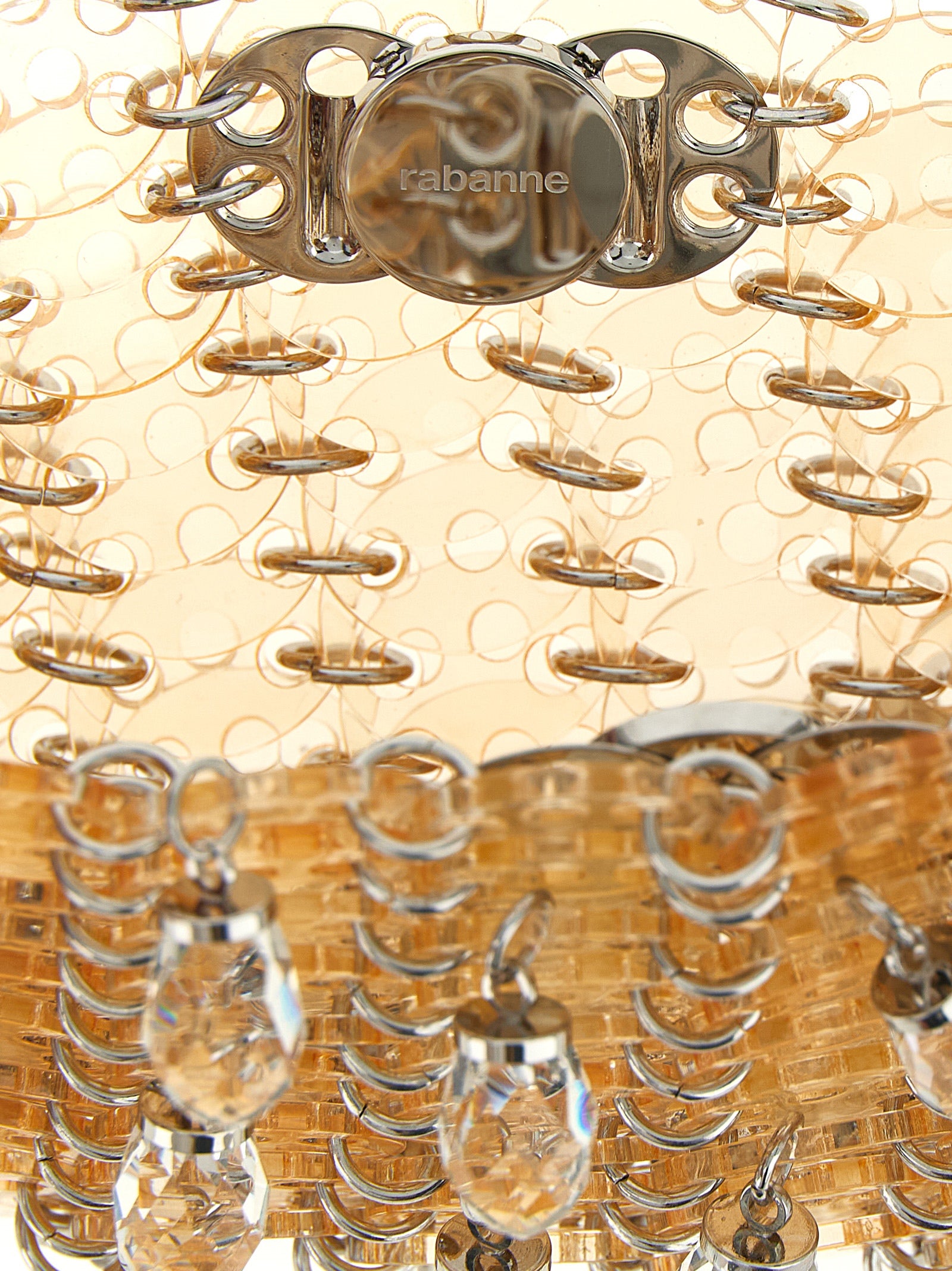 Sac à bandoulière en plexiglas multicolore de Paco Rabanne avec design moderne et épuré visible sur l'image.