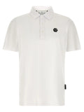 Polo blanc en coton philipp plein à manches courtes avec logo hexagonal noir sur la poitrine et branding au col