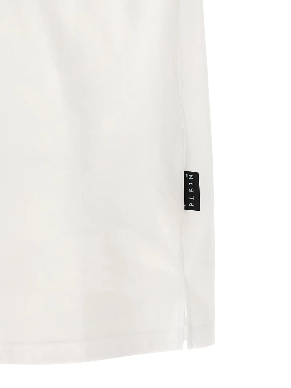 Philipp plein polo shirt en coton blanc avec tissu plissé et étiquette noire plein en majuscules blanches