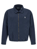 Veste polo ralph lauren bleue en coton avec logo blanc brodé sur la poitrine et fermetures éclairs dorées