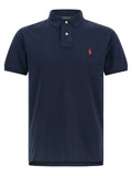 Polo ralph lauren bleu en coton avec logo cheval rouge brodé et boutons blancs sur la poitrine gauche