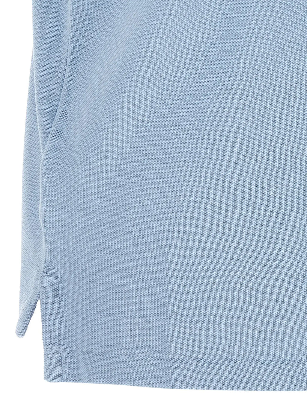 Polo ralph lauren bleu clair en coton avec tissu piqué texturé et ourlet soigneusement cousu