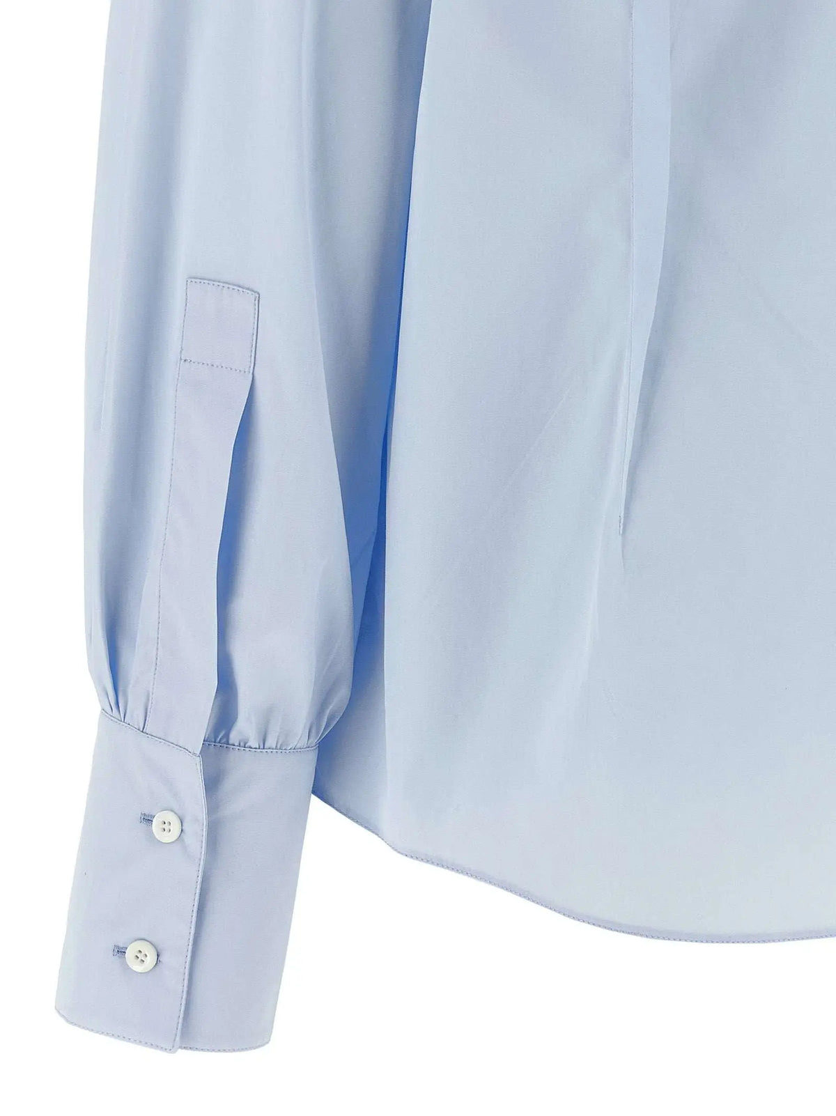 Chemise prada bleue en coton à manches longues avec léger éclat et poignets finement cousus