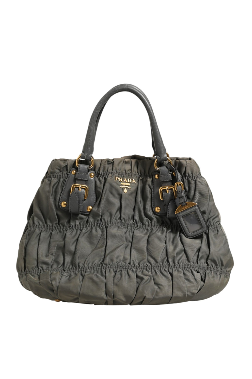 Sac tote Prada Tessuto Nylon Gaufre en nylon tissé, avec poignées épaisses et logo Prada visible.