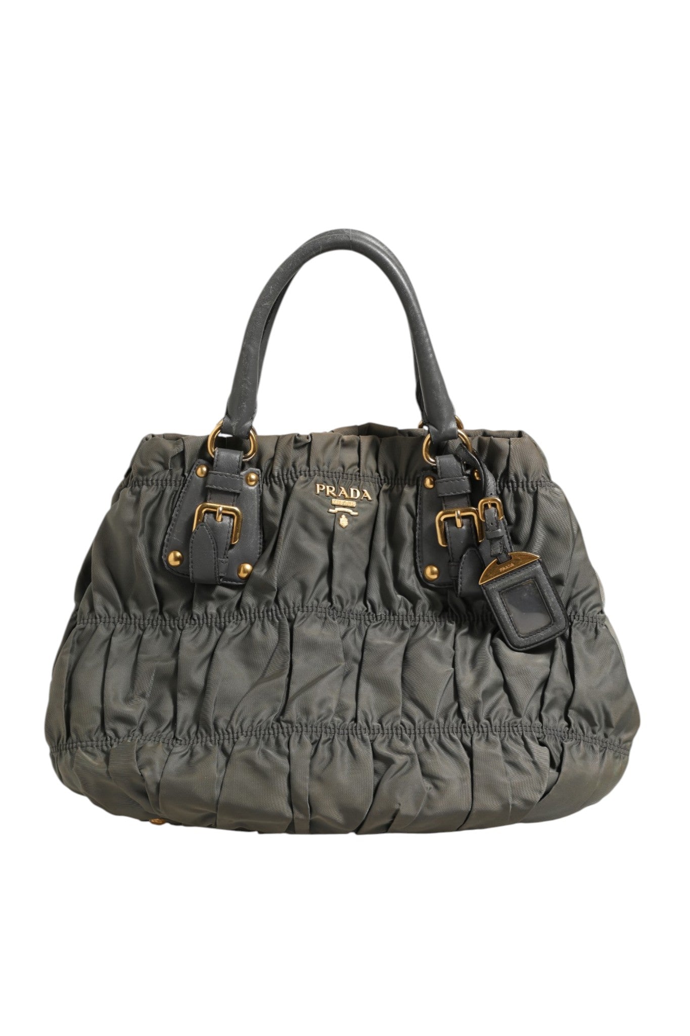 Sac tote Prada Tessuto Nylon Gaufre en nylon tissé, avec poignées épaisses et logo Prada visible.