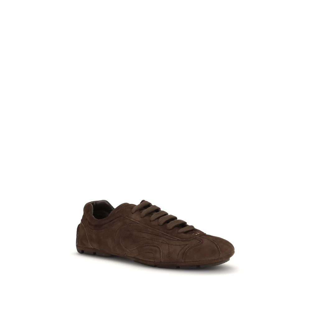 Chaussures de sport Prada Bos Taurus en cuir de veau brun, baskets athlétiques élégantes avec détails en cuir marron.