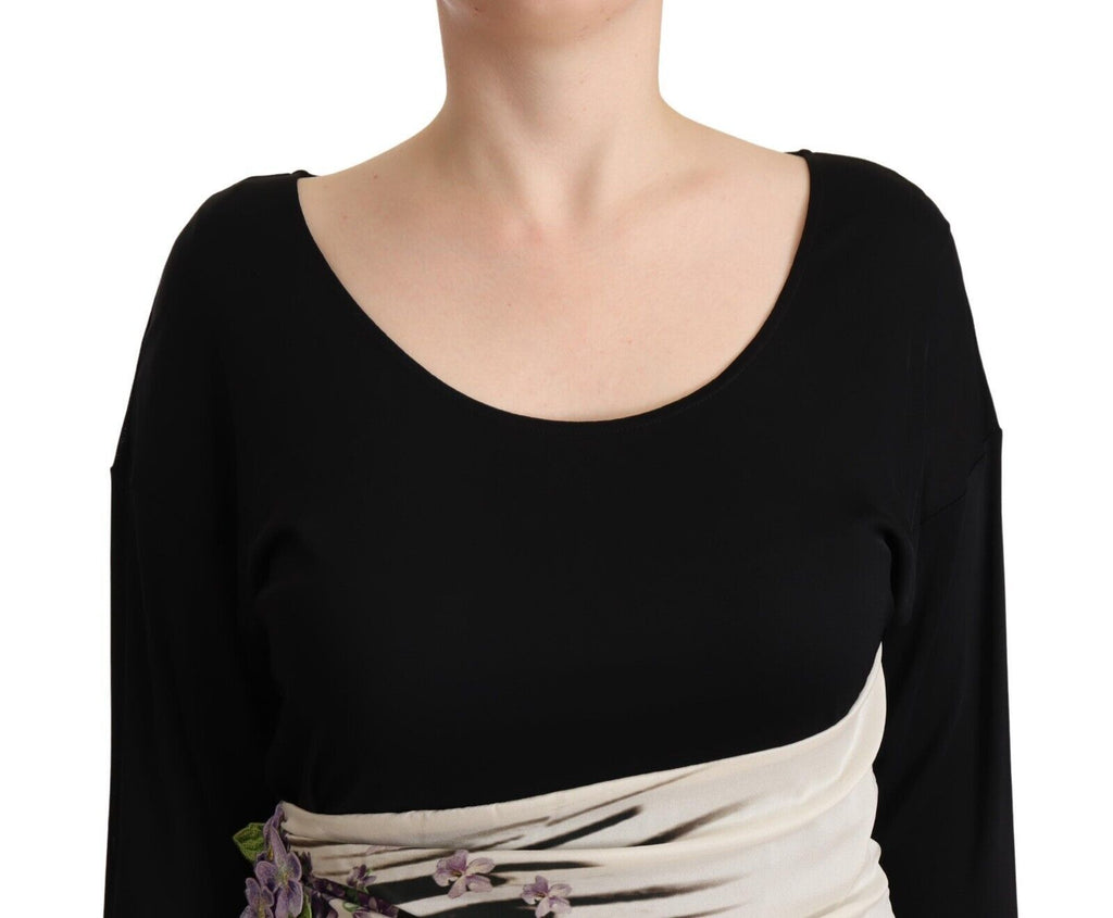 Robe fourreau noire et argentée Roberto Cavalli, longueur au genou, tissu élégant et design sophistiqué.