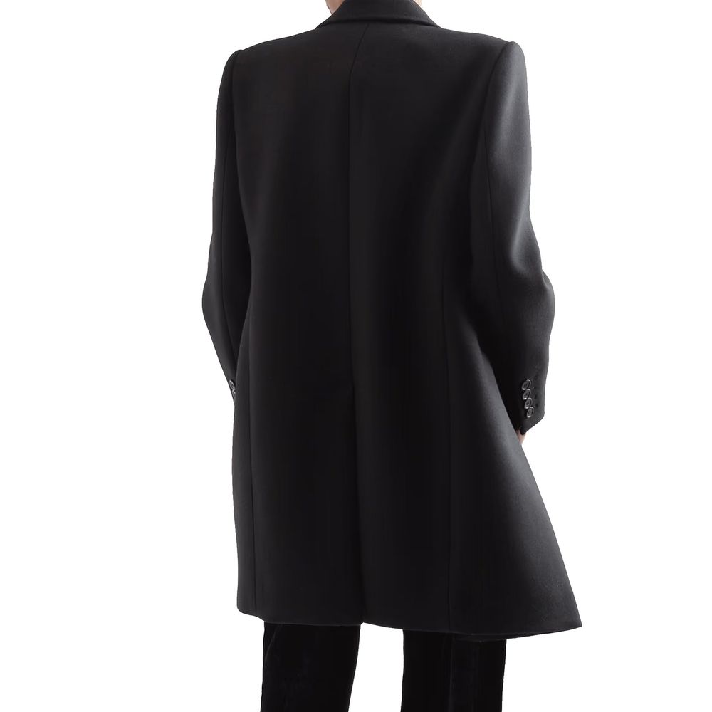 Manteau en laine noire Saint Laurent pour homme, coupe classique et élégante, visible sur un mannequin.