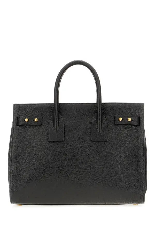 Sac de jour saint laurent en cuir de veau noir avec poignées supérieures et ferrures dorées