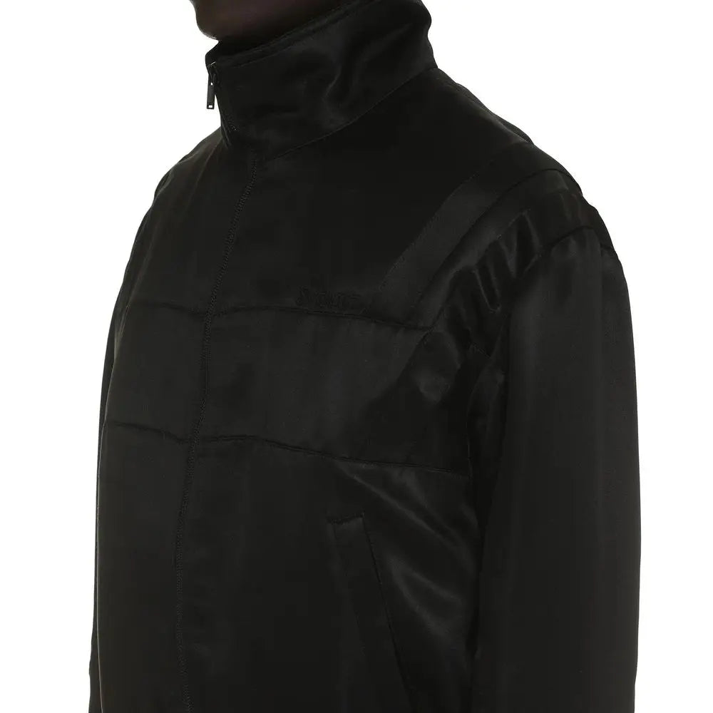 Veste noir en satin saint laurent avec panneaux matelassés et col montant en duvet
