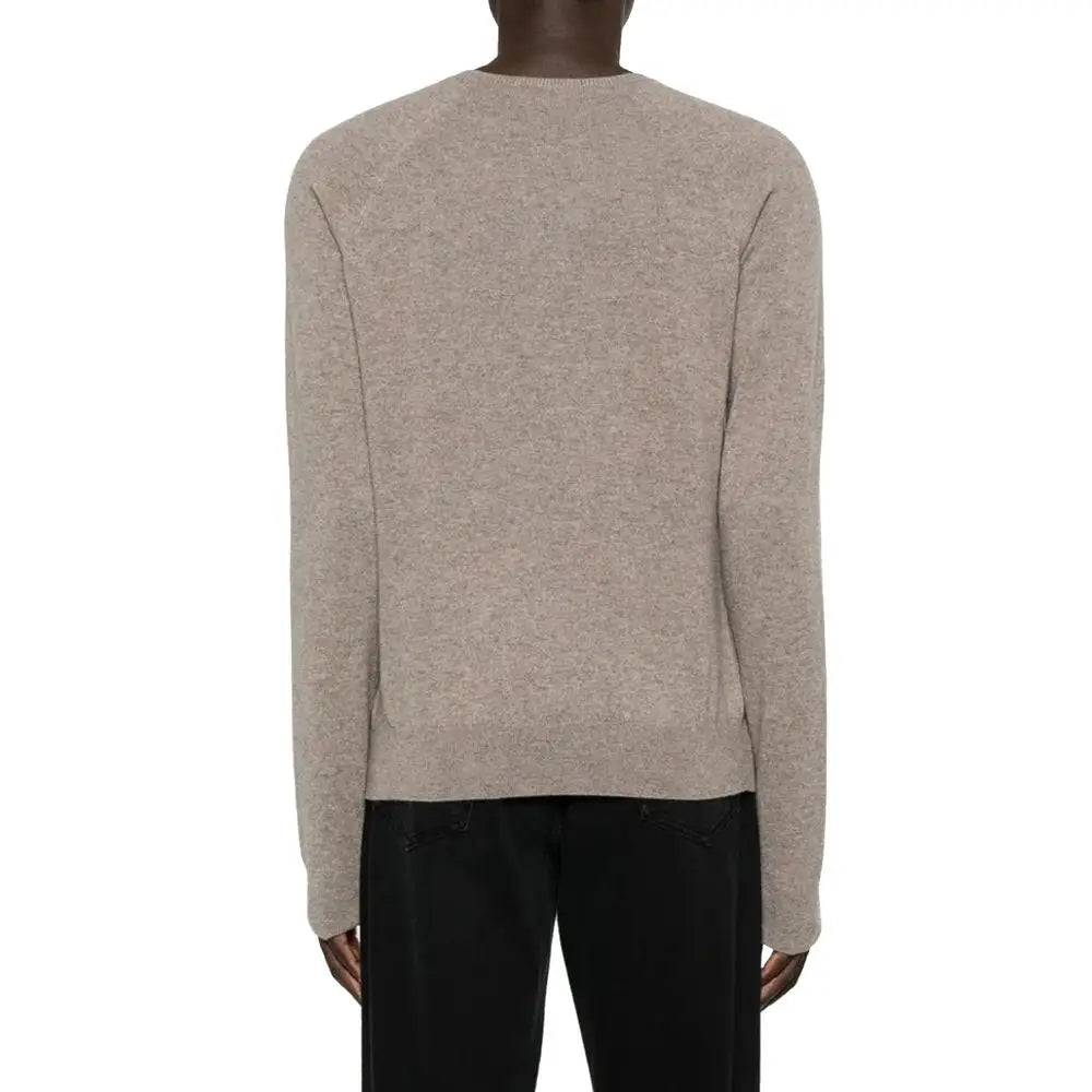 Beige merino wool crewneck sweater with subtle heathered texture and ribbed cuffs by Saint Laurent