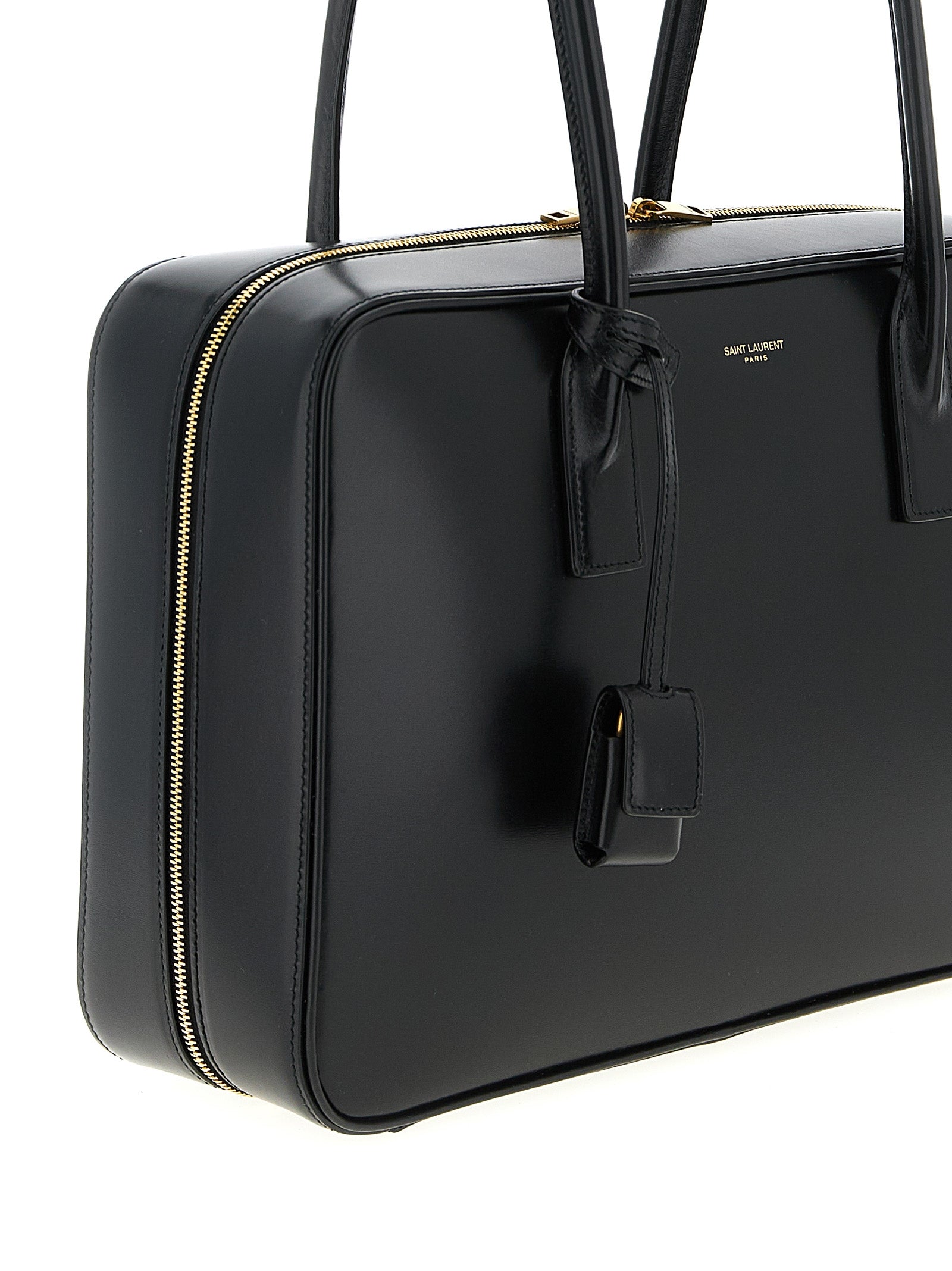 Sac à bandoulière en cuir de veau noir de Saint Laurent, élégant et sophistiqué, avec détails en métal doré.