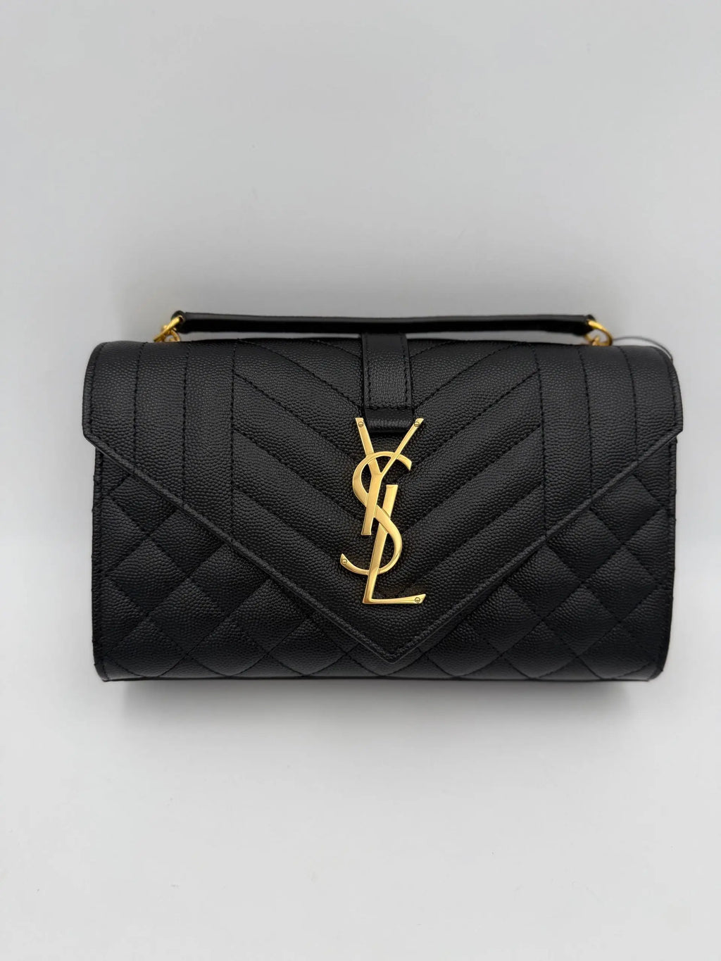 Sac en cuir grainé noir saint laurent envelope small avec quilting et fermoir logo ysl doré