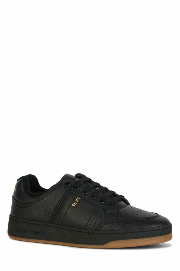 Baskets basses en cuir noir Saint Laurent pour homme, semelle en caoutchouc, design élégant et moderne.