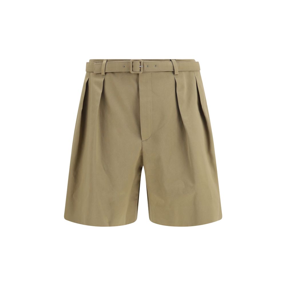 Shorts bermuda en coton beige de Saint Laurent, style décontracté, avec ceinture et poches visibles.