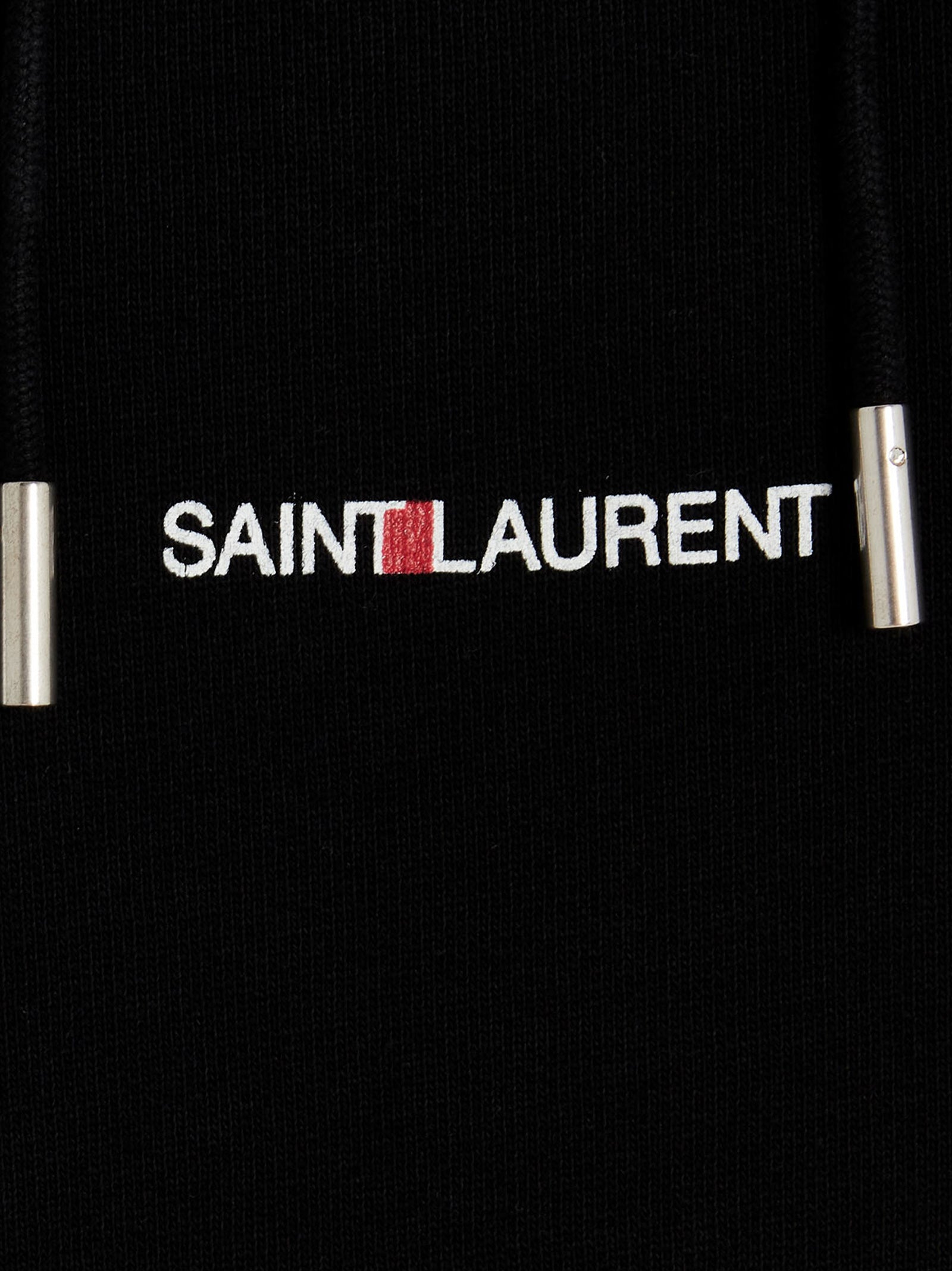 Sweat-shirt noir en coton de la marque Saint Laurent, coupe classique et logo discret sur la poitrine.
