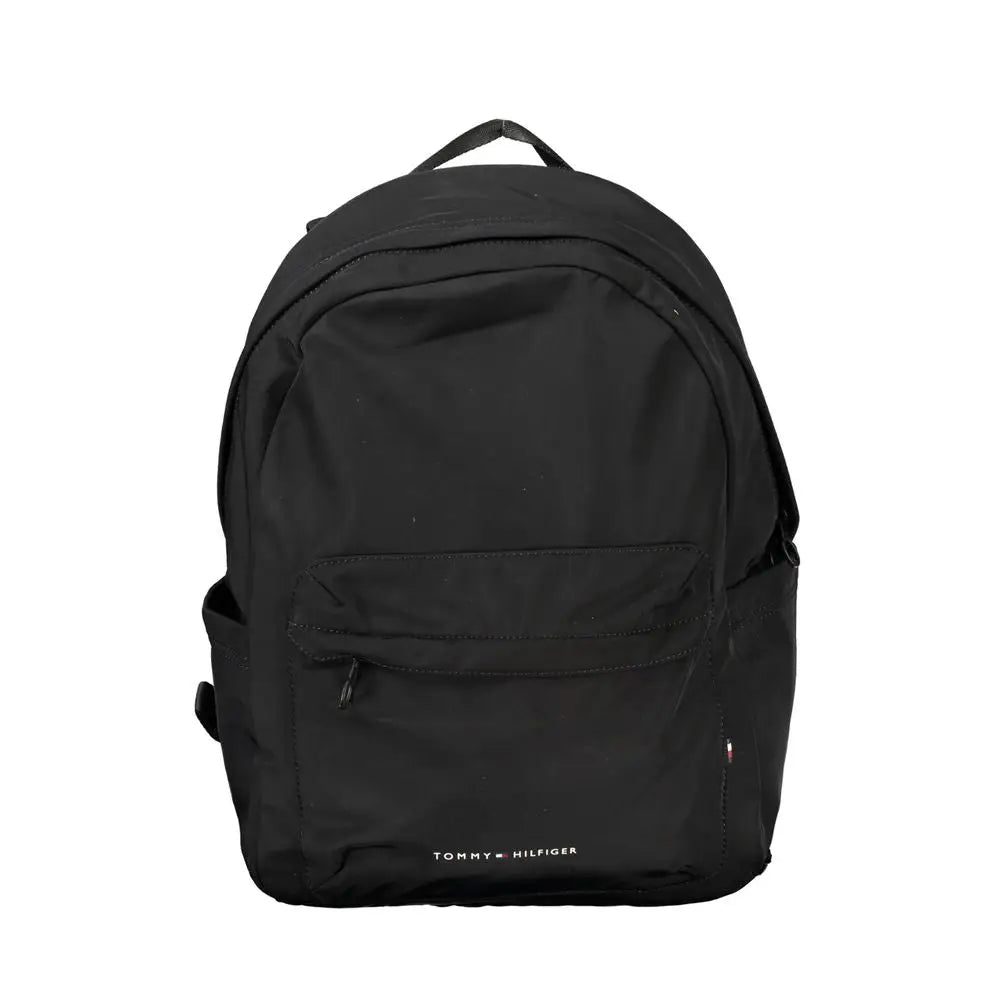Sac à dos noir tommy hilfiger avec design minimaliste et logo blanc subtil en bas pour homme