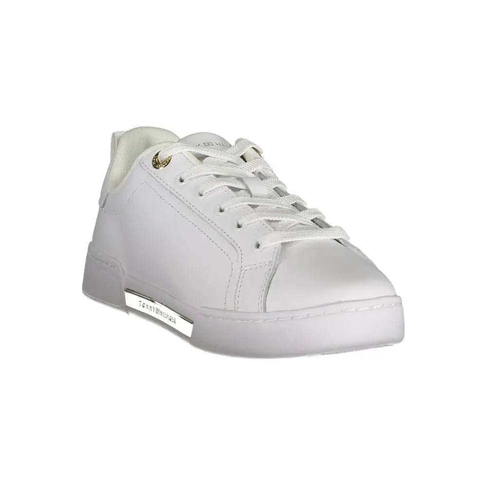 Sneaker femme tommy hilfiger bianco en cuir blanc avec œillets dorés et bande logo argentée sur le côté