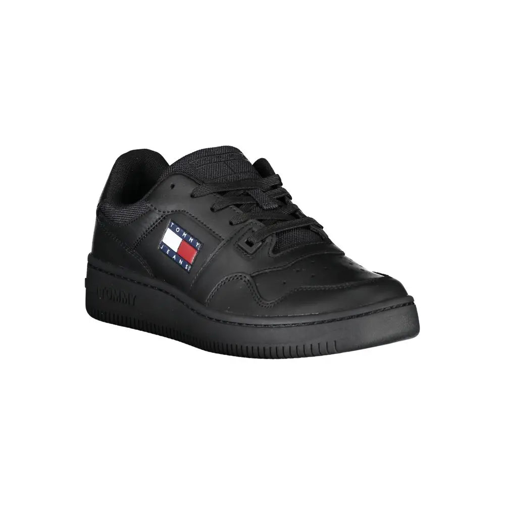 Baskets basses tommy jeans noires en cuir brillant avec patch drapeau signature tommy hilfiger sur le côté